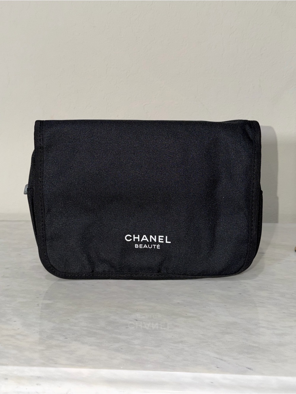 CHANEL Black Toiletry Pouch with White Logo